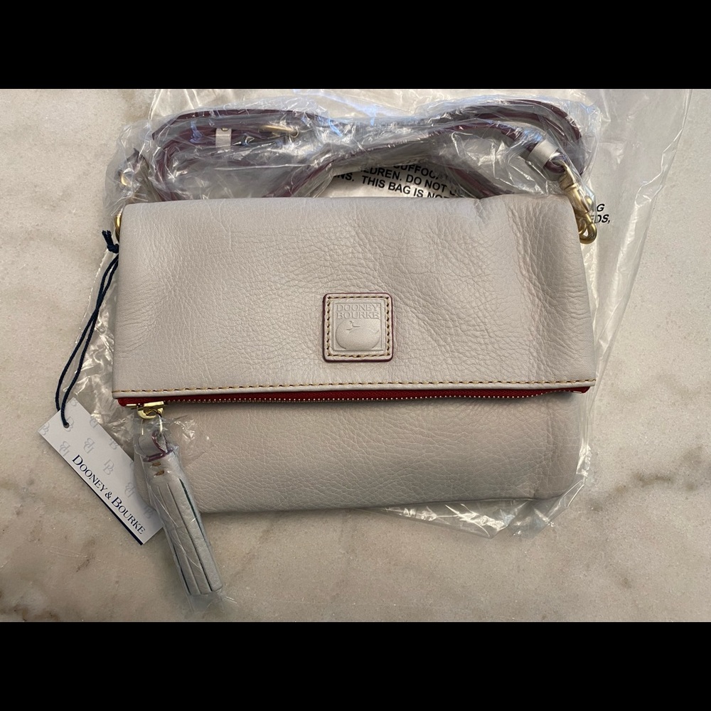 SOLD! Dooney and Bourke Ecru Florentine Flap Crossbody